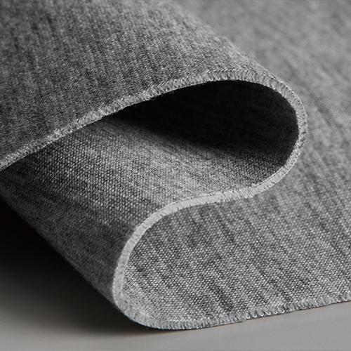 2枚の生地を中糸で繋ぎあわせた多重構造のダンボールニット生地(断面図)<br />